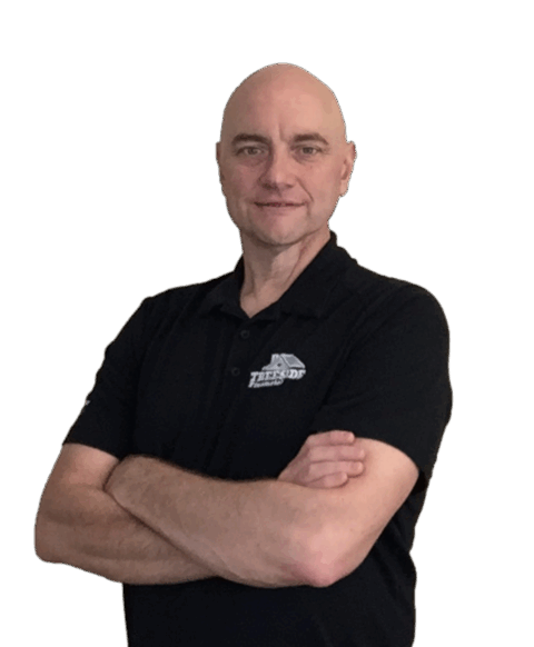Jim Mucci, a mortgage loan originator, standing confidently with arms crossed in a Treeside Financial shirt.